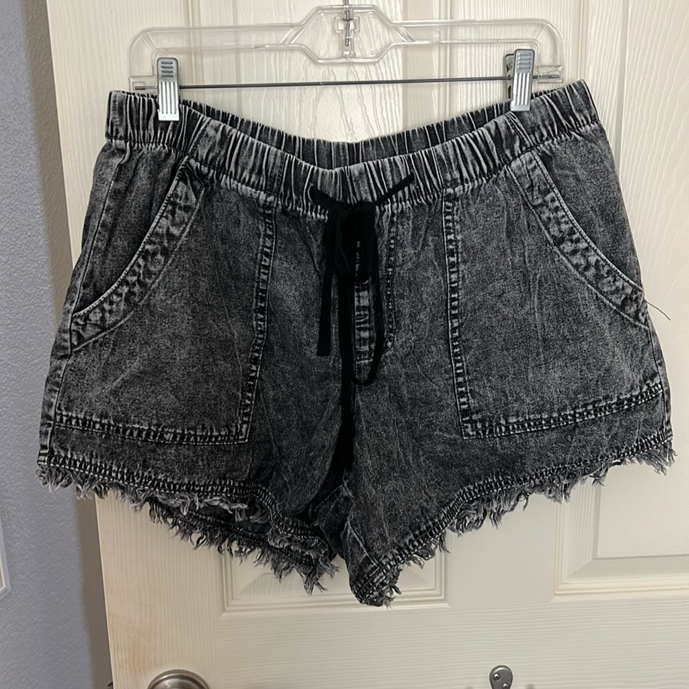 Women’s faded and distressed black shorts